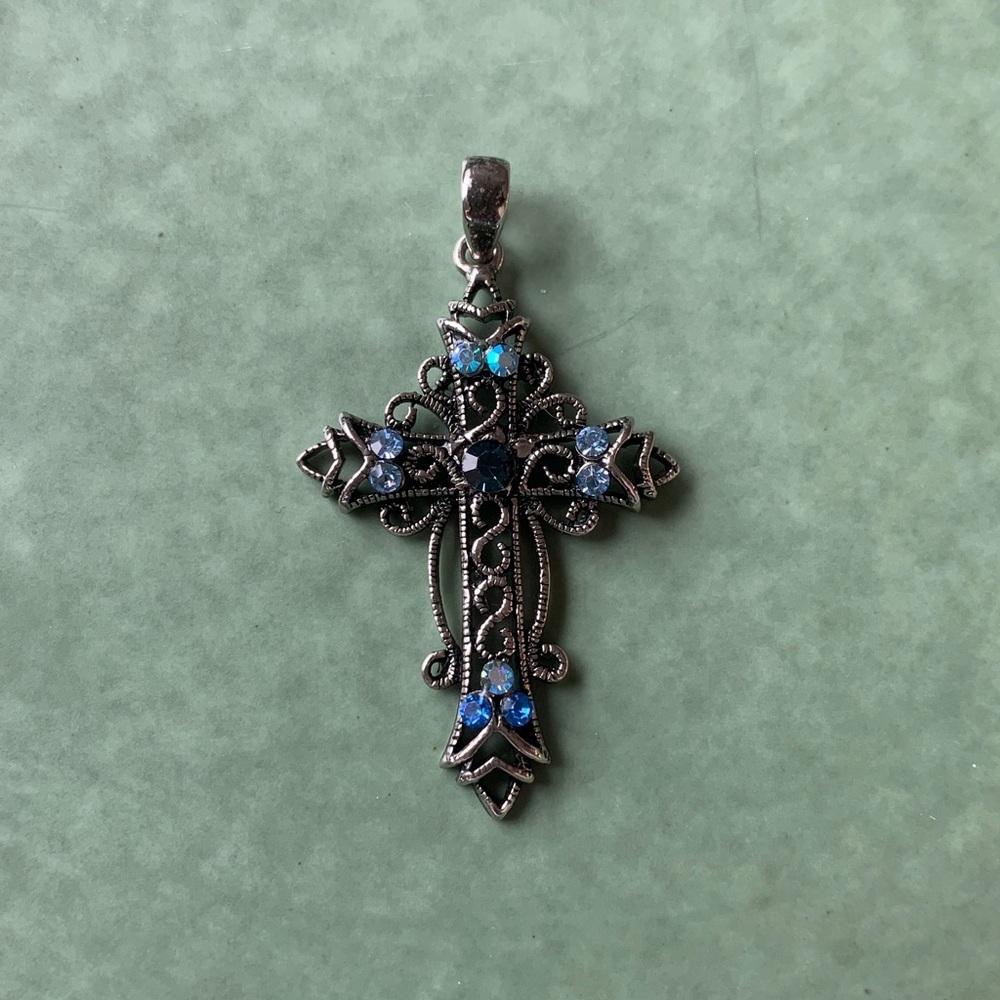 Black Stainless steel cross with multi shade blue crystals! Stunning colors!✨